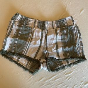 Small beach cover up shorts or shorts for a middle school-elementary aged girl.